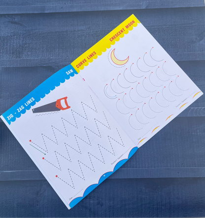 Educational tracing worksheet on a blue surface