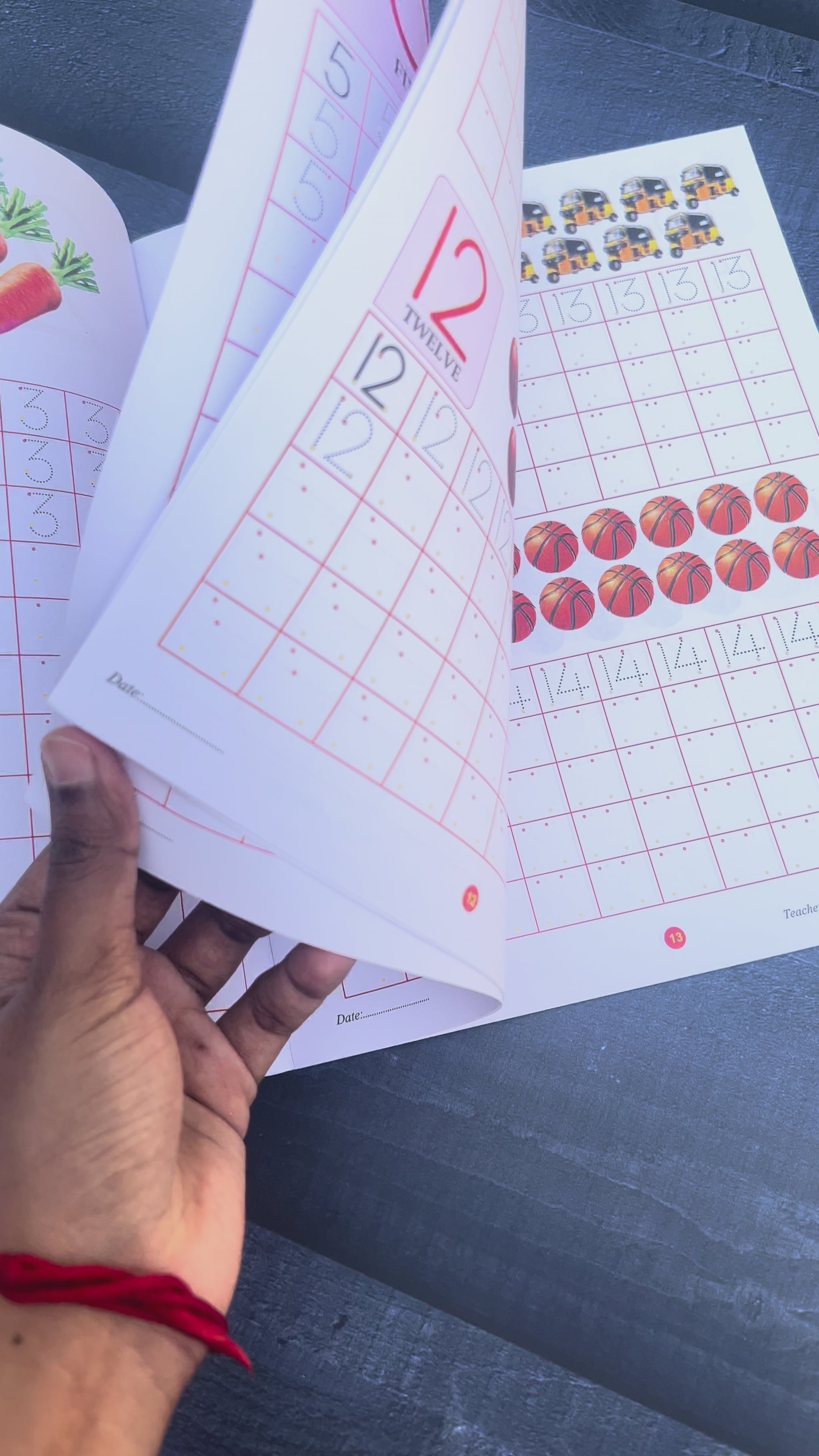 numbers writin gpractice book flipped through some pages.